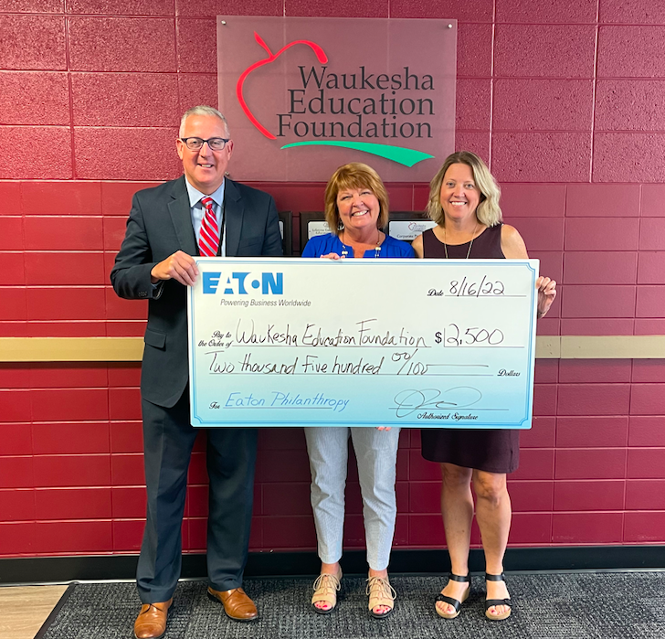 Jackie Pride from Eaton Corporation presents a $2500 check to the WEF. Pictured: Dr. Sebert (SDW Superintendent), Jackie Pride (Eaton) & Lynnette Kalmadge (WEF Executive Director)
